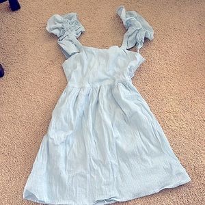 Light blue dress, size medium. Ruffle sleeves, Open back with tie.